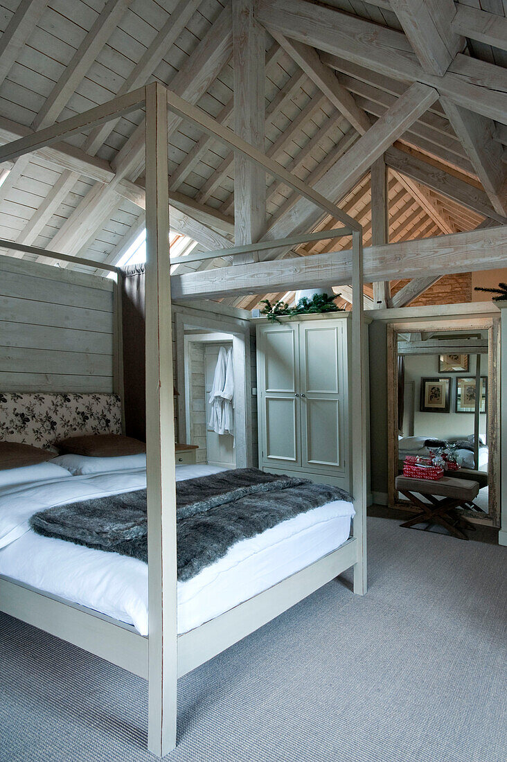 Wood framed bed in Wiltshire home