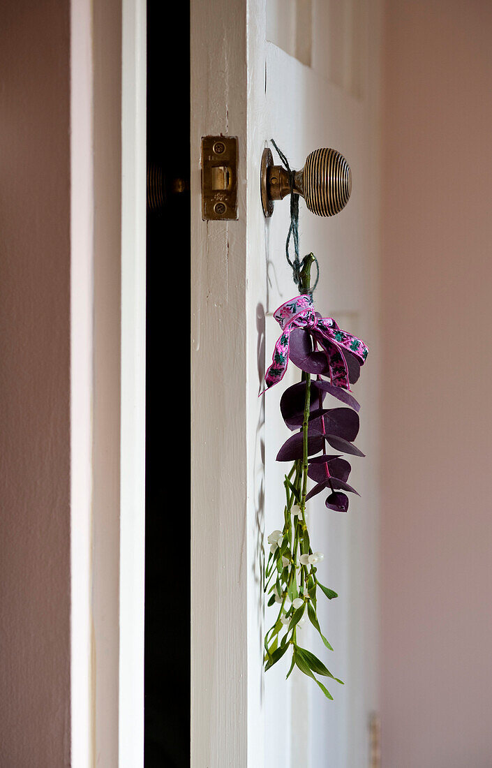 Flowers hang from door handle