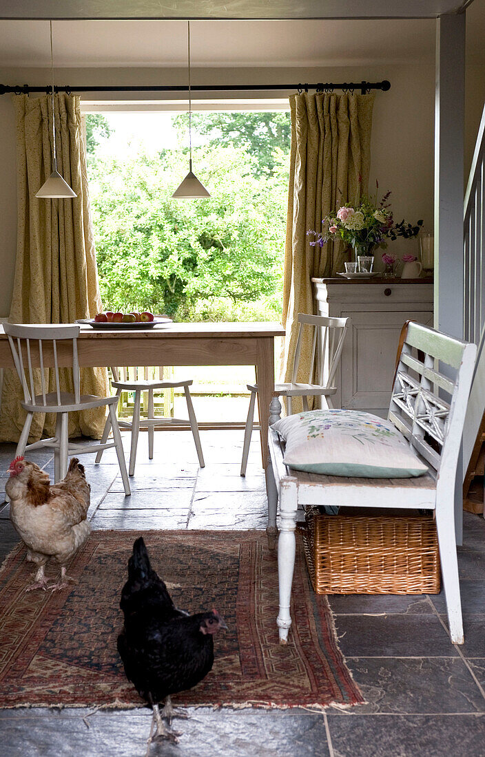 chickens in an open plan dining room