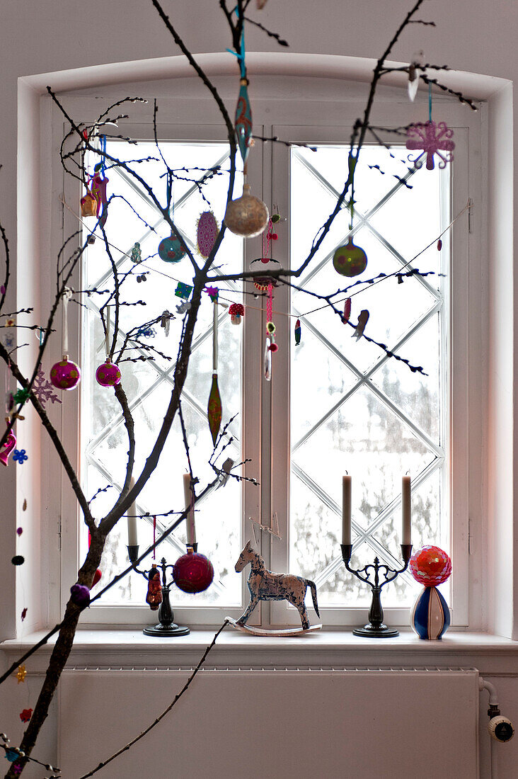 Christmas decorations at window of modern Odense family home Denmark