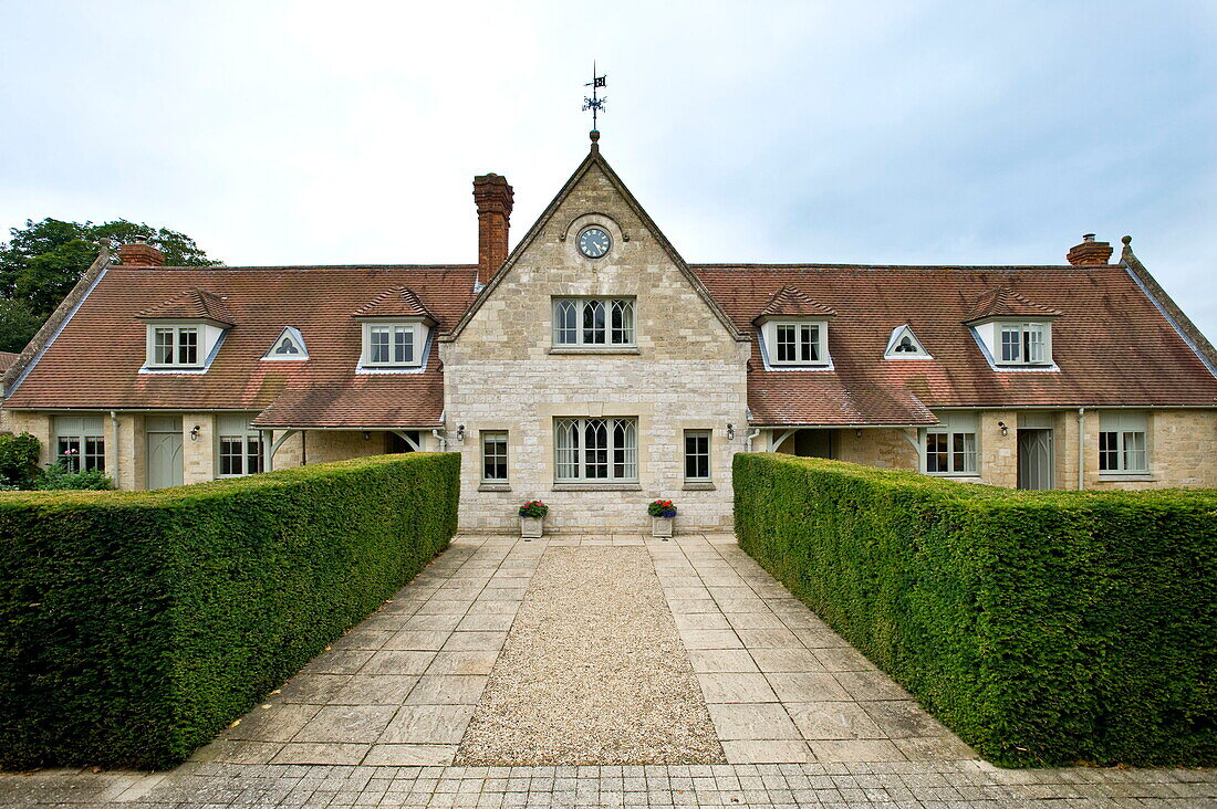 Hedging and driveway of Buckinghamshire home exterior, England, UK
