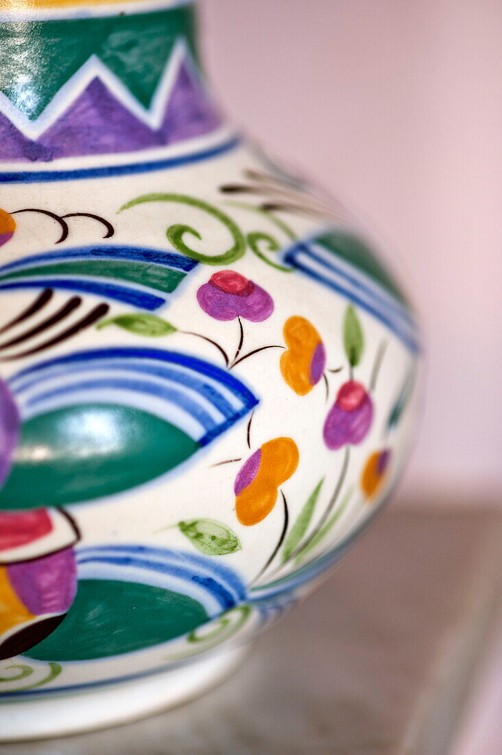 Hand painted vase in Bovey Tracey family home, Devon, England, UK