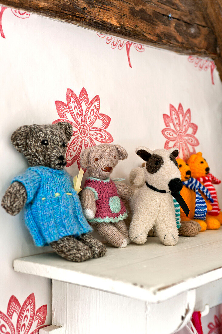 Soft toys on shelf in Hertfordshire home, England, UK