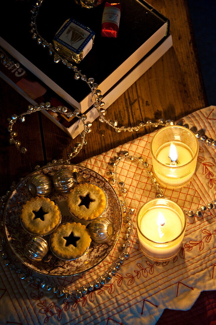 Lit candles and mince pies in Shropshire cottage, England, UK