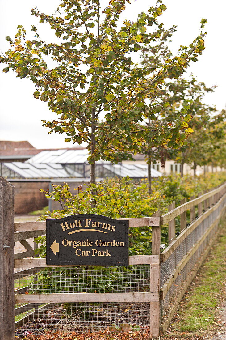 Directional sign to carpark in organic farm, Blagdon, Somerset, England, UK