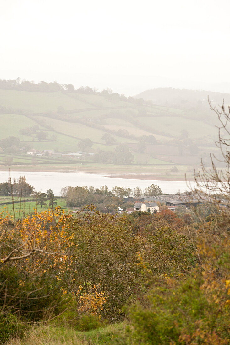 Rural hillside and river valley view in Blagdon, Somerset, England, UK