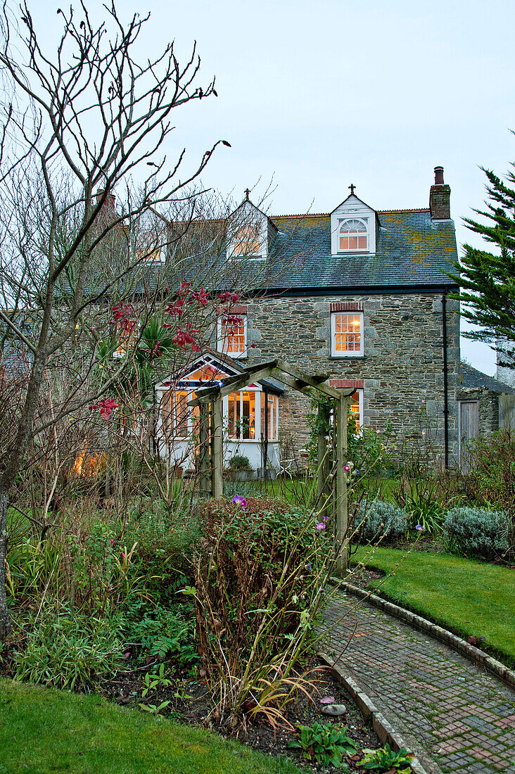 Back garden exterior of three-storey Crantock home Cornwall England UK