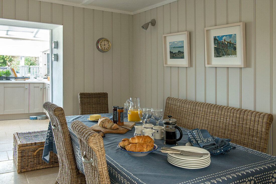Breakfast table with croissants and jam in Penzance farmhouse Cornwall England UK