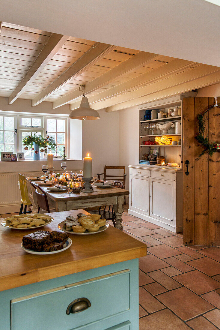 Mince pies on worktop in open plan kitchen dining room at Christmas in St Erth cottage Cornwall UK