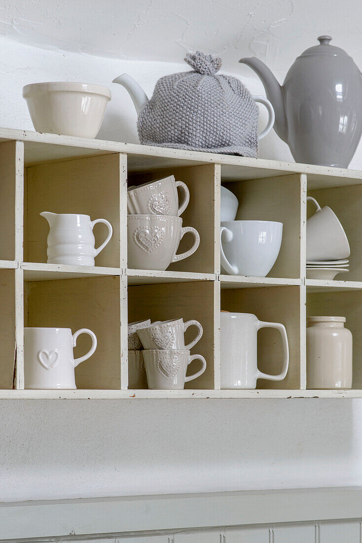 Cup storage with teapot in Marazion beach house Cornwall UK