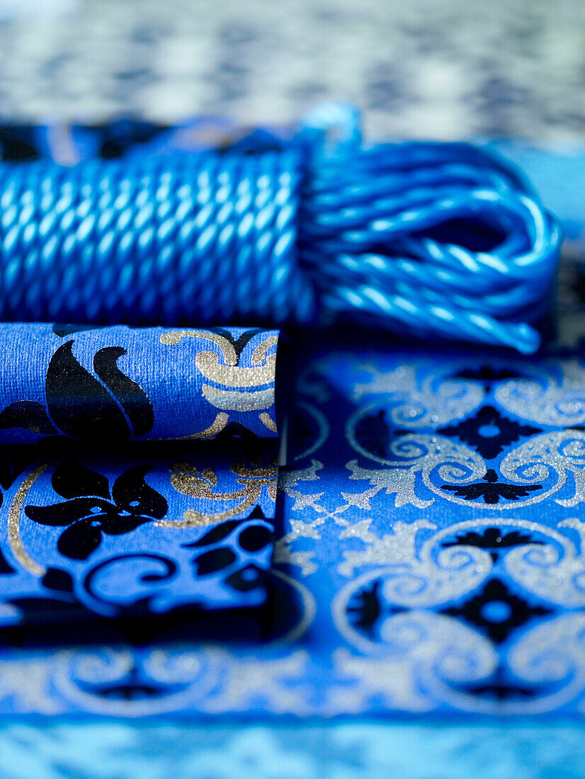 Blue string and decorative wrapping paper