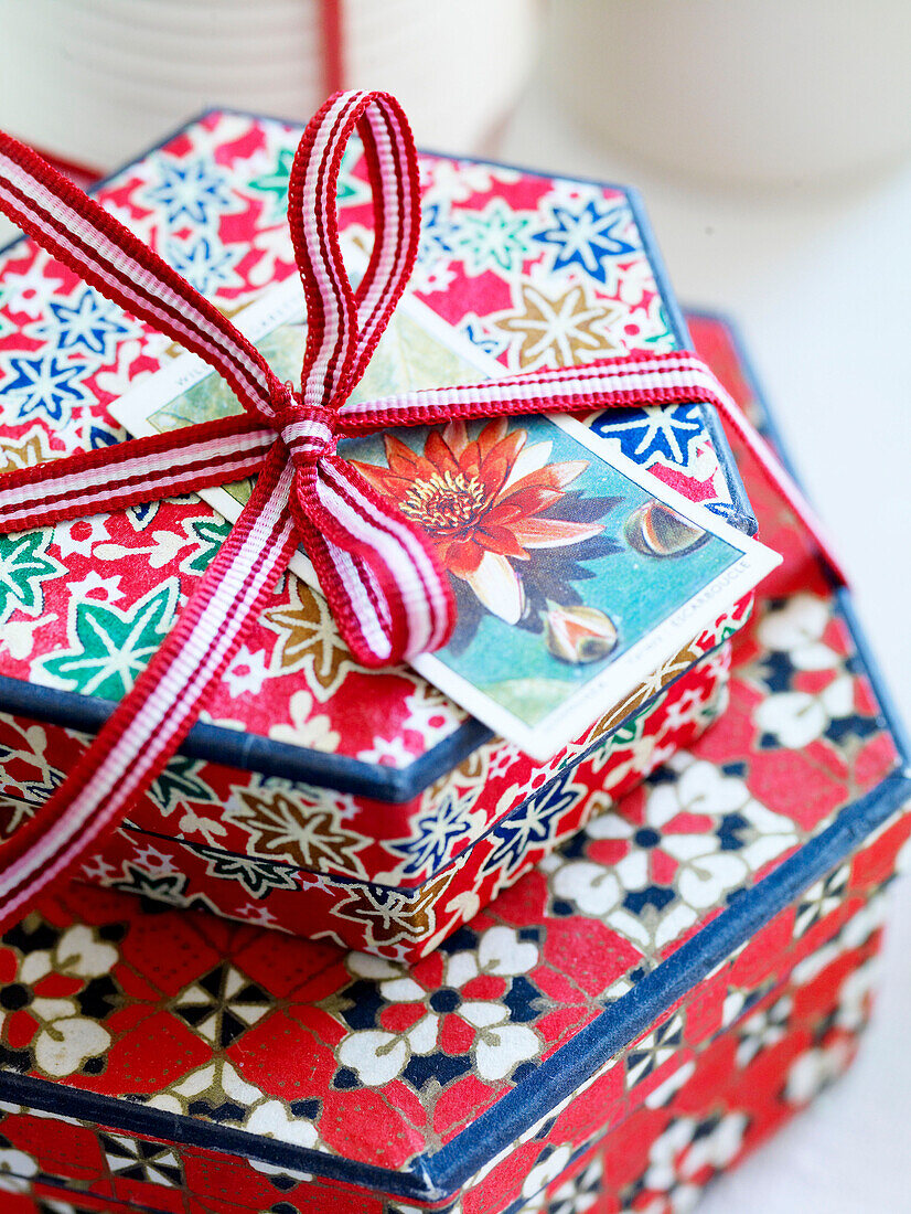Decorative red gift boxes tied with ribbon