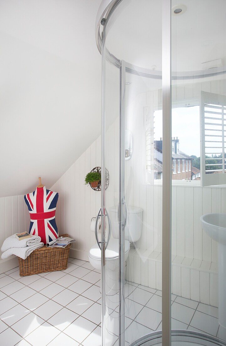 Shower cubicle and union jack mannequin in attic conversion, Cranbrook, Kent, England, UK