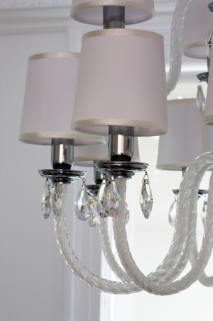 Glass chandelier lampshades in London home UK