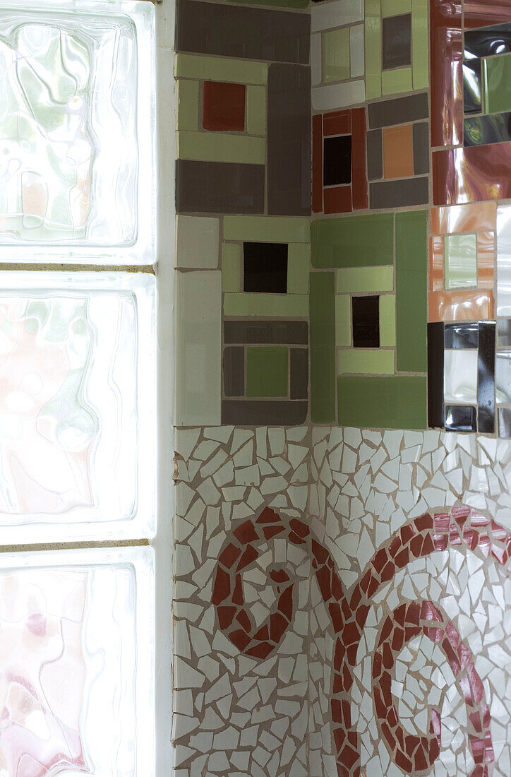 Contrasting tiled patterns and glass bricks in Cambridgeshire home UK