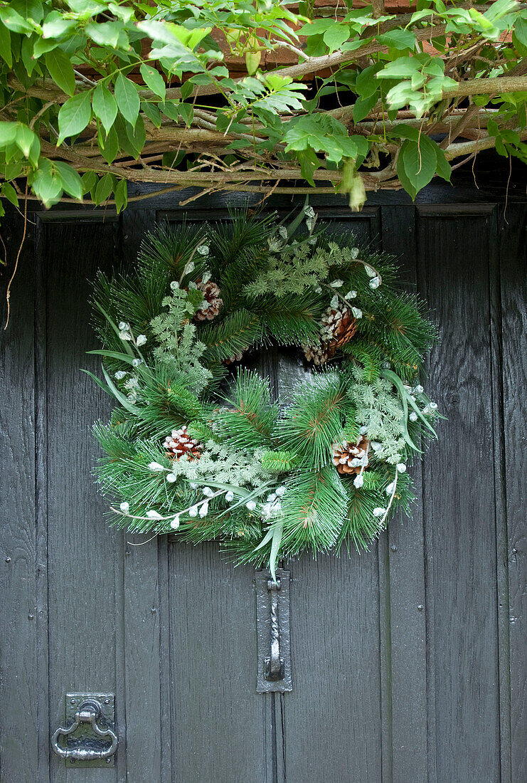 Front door with Christmas garland Sussex UK