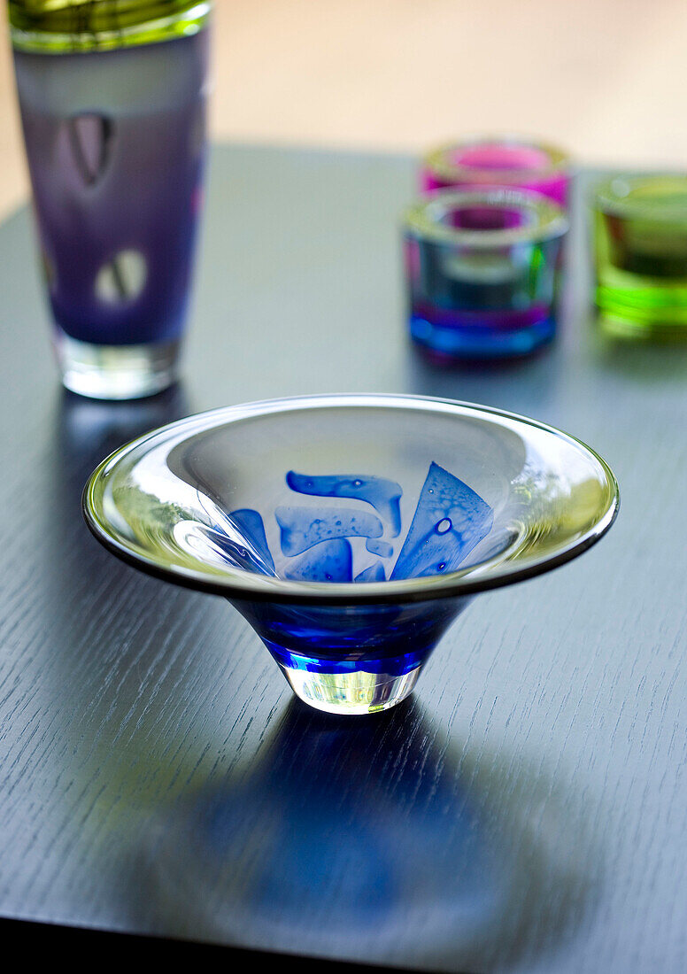 Hand painted glassware in contemporary London home, England, UK