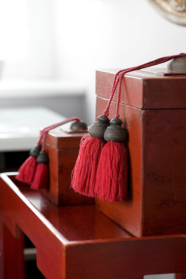 Tassels on Chinese storage boxed in Wepham home Sussex UK