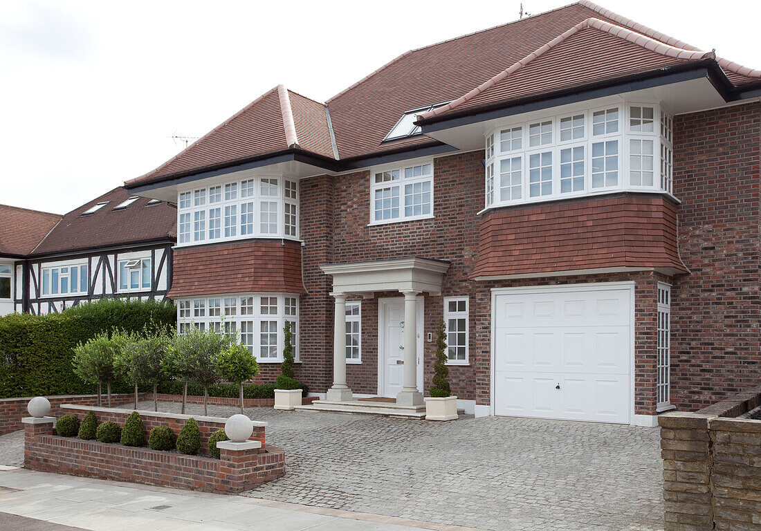 Brick exterior and driveway of Hendon home London UK