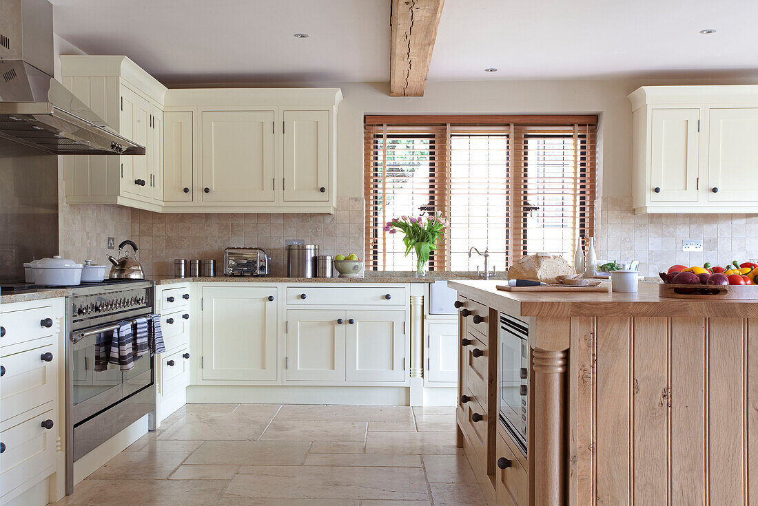 White fitted kitchen in Cotswolds home UK