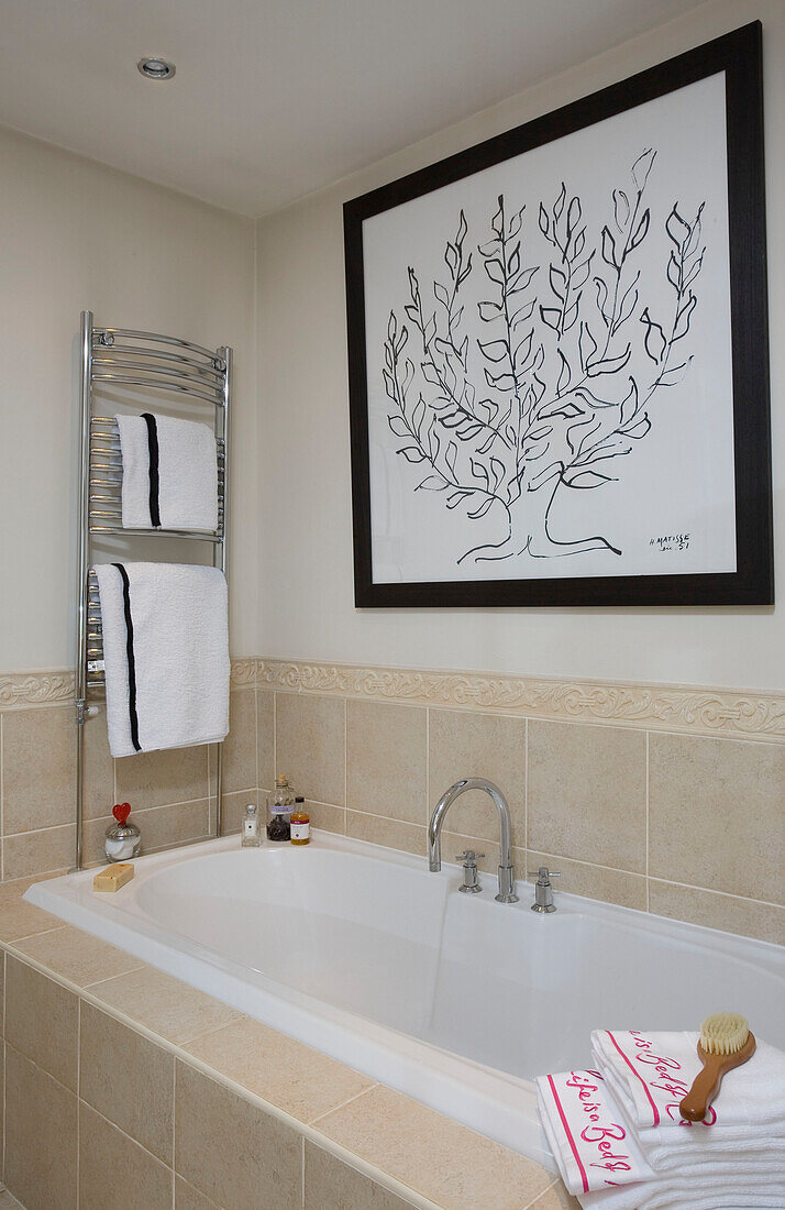 Large artwork over bath in classic Tyne & Wear home, England, UK