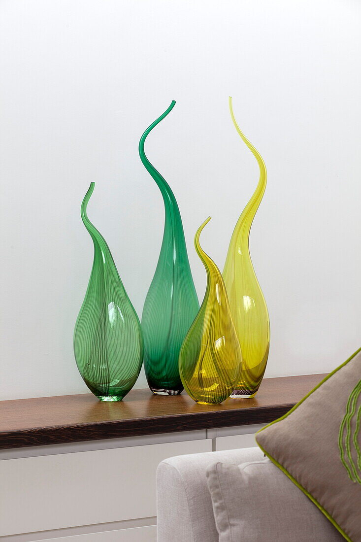 Four glass ornaments in contemporary London home, England, UK