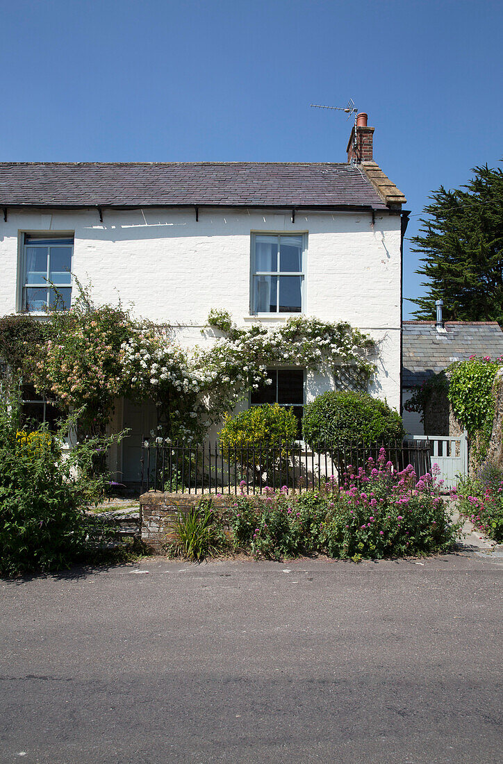 Whitewashed cottage exterior, Dorset, England, UK