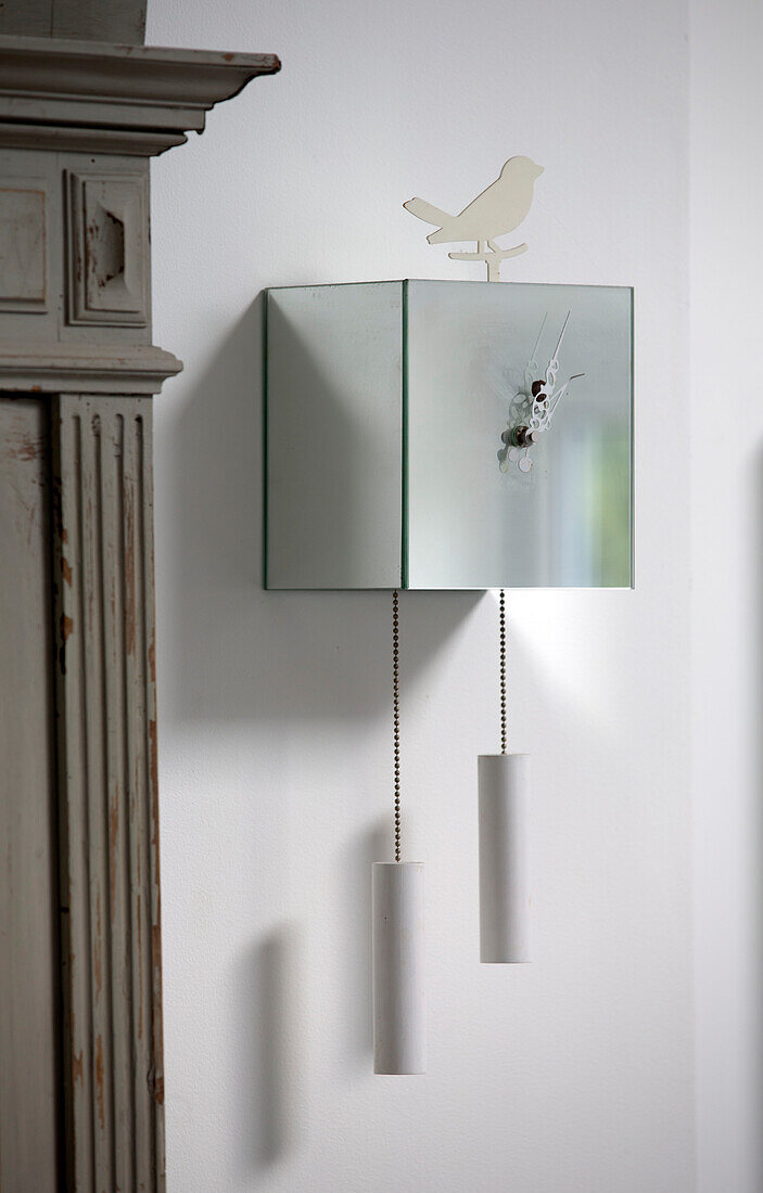 Modern cuckoo clock in London townhouse, England, UK