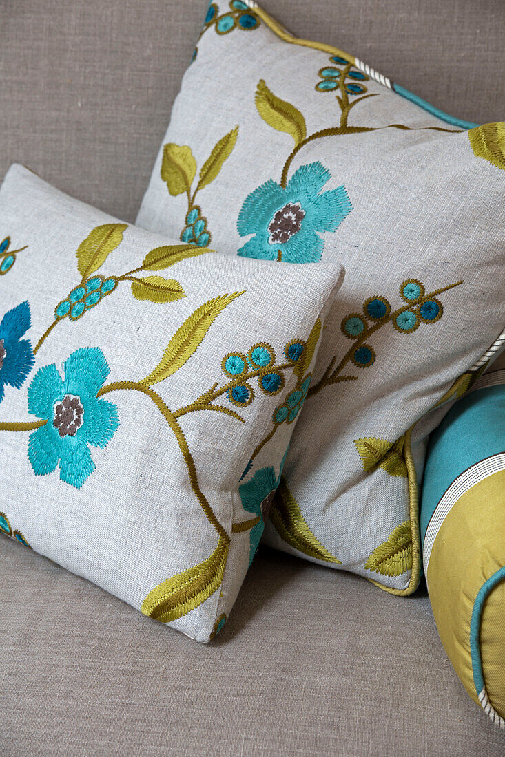 Floral embroidered cushions in London home   England   UK