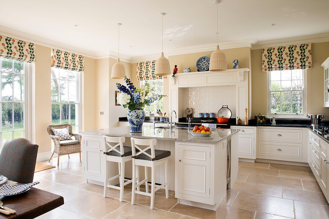 Island unit in spacious kitchen of Pewsey country house Wiltshire England UK
