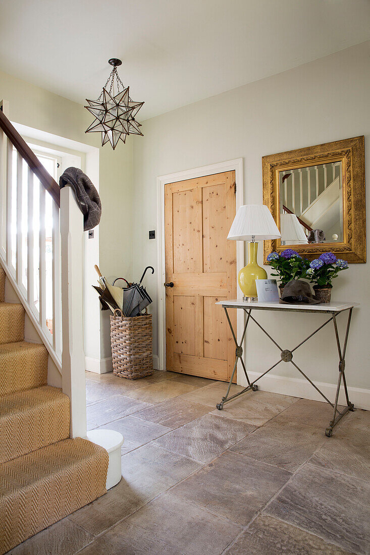 Star shaped lamp in hallway of renovated Victorian schoolhouse West Sussex England UK