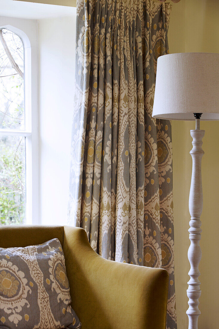 Standard lamp with co-ordinated fabrics in Gloucestershire living room England UK