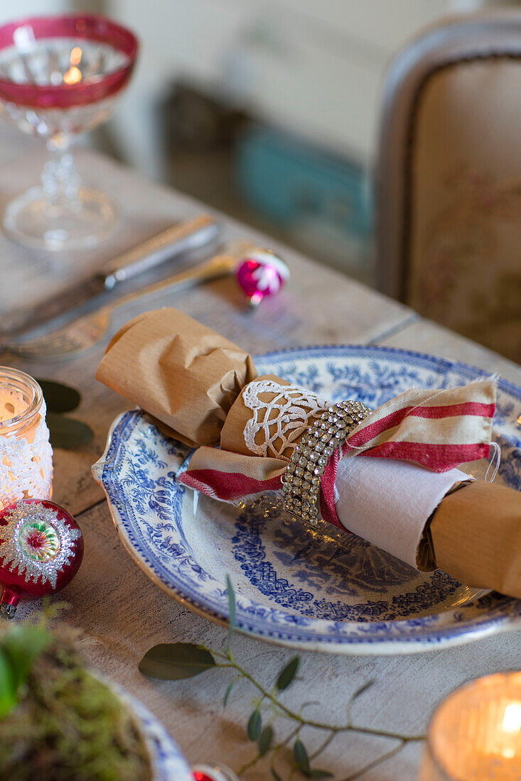 Handmade Christmas cracker on side plate in Norwich home Norfolk UK