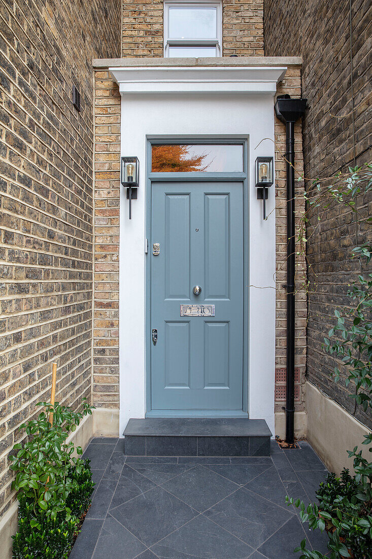 Front door in De Nimes of Victorian workers cottage built 1870 London UK