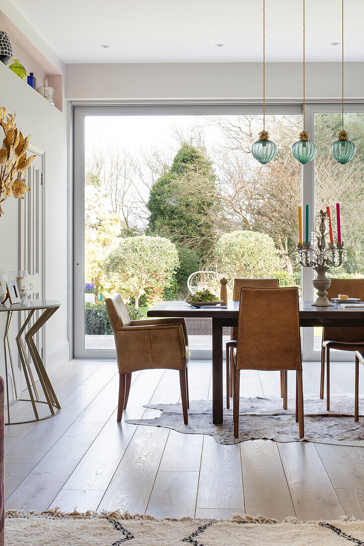 Dining table with garden view in extended Victorian villa Tunbridge Wells Kent UK