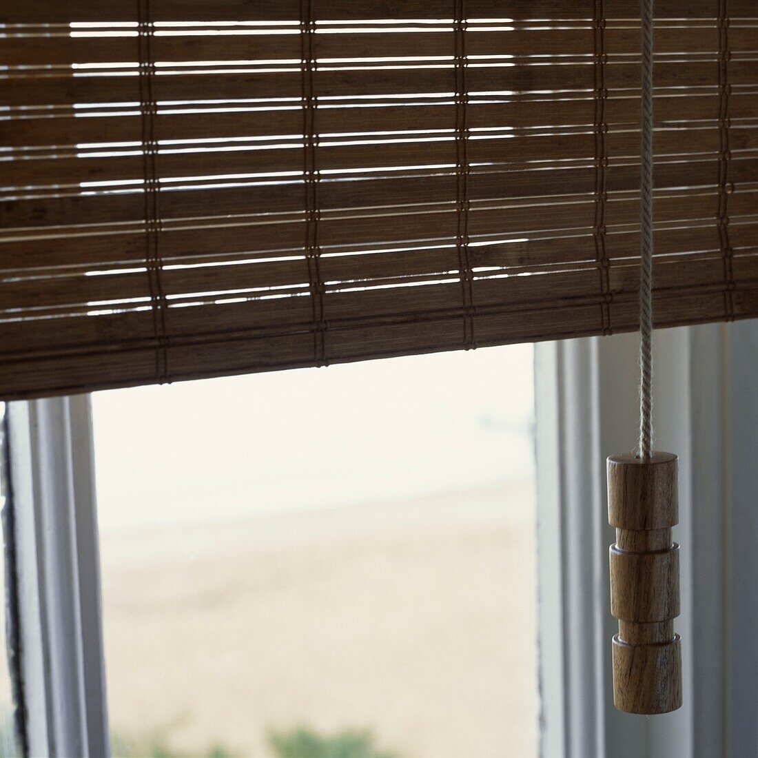 Window treatment wooden blind and blind pull