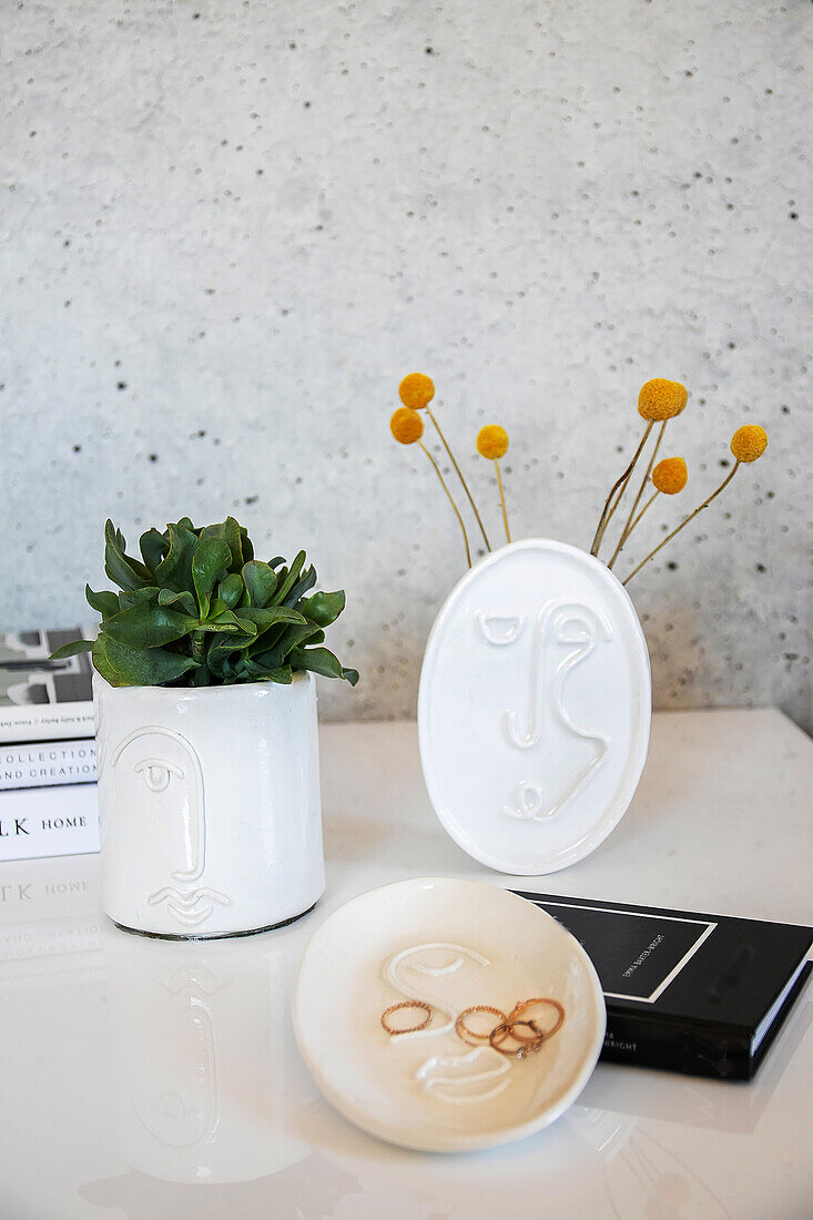 Homemade flower pot and bowls made from modelling clay