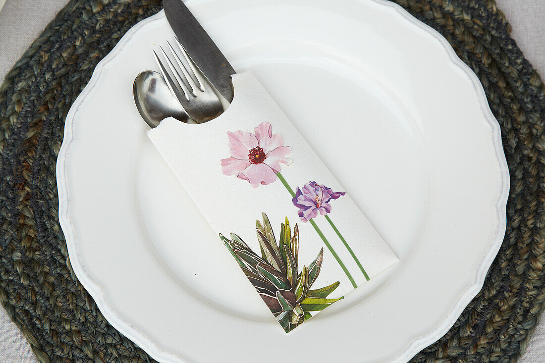 DIY paper cutlery bags with a floral motif