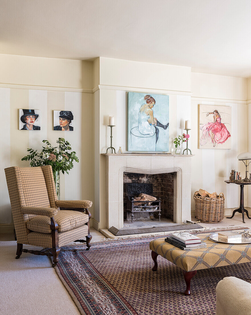 Bright living room with an ottoman coffee table on an oriental rug and artwork on wall in living room