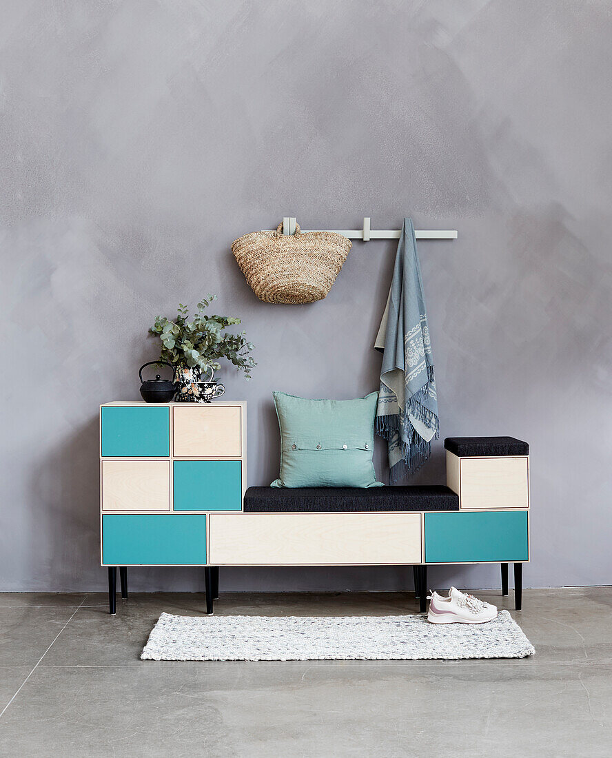 Turquoise and white sideboard with integrated bench