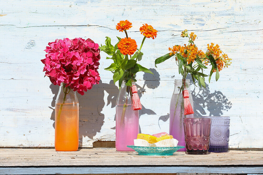 Colorful DIY vases made from milk bottles