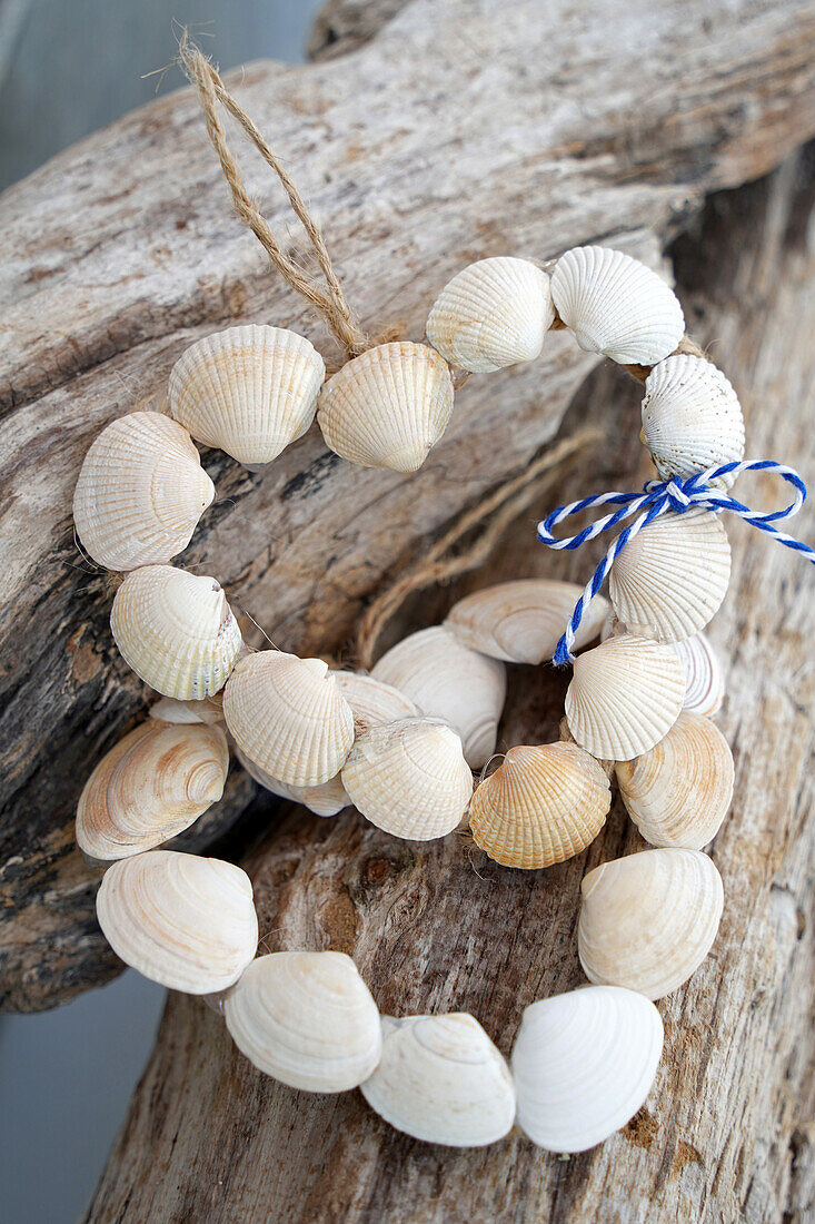 DIY hearts made from shells on driftwood