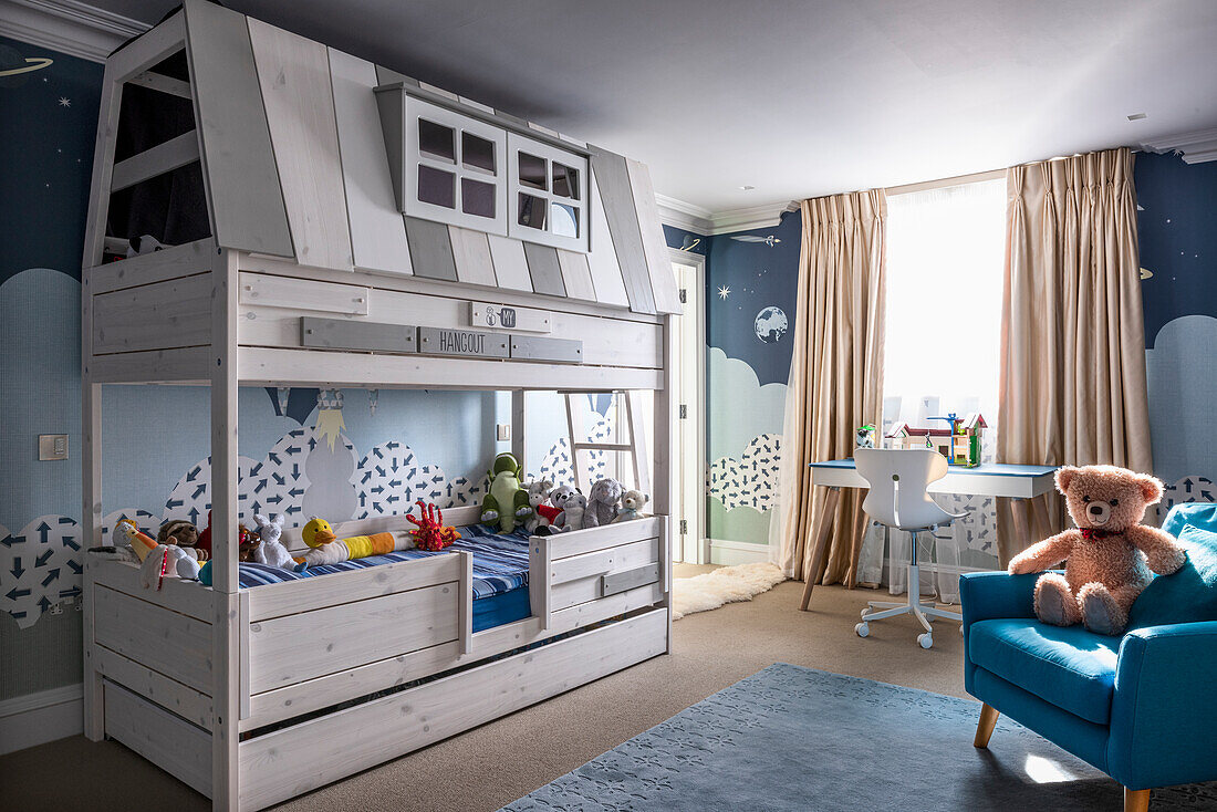 Boys' bedroom with bunk bed in Holland Park style and cuddly toy on armchair