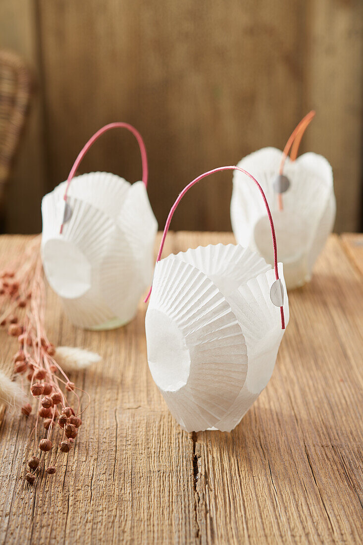 DIY lanterns made from muffin moulds