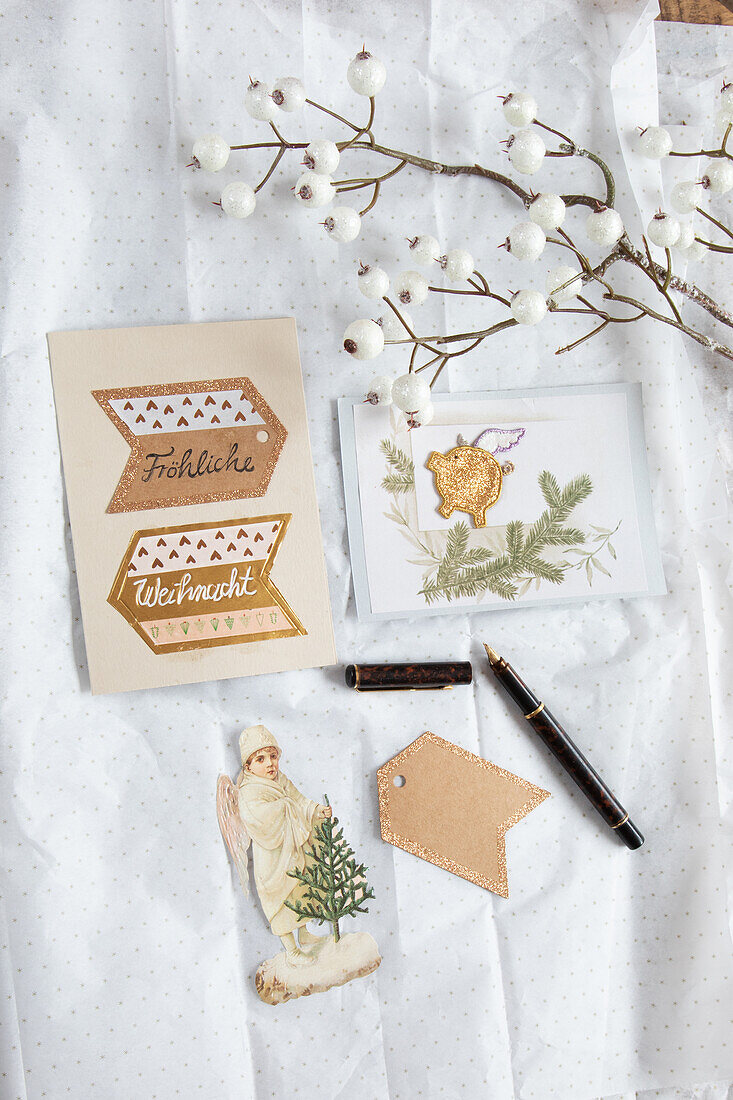 Christmas greetings cards and decorations with white berry branches