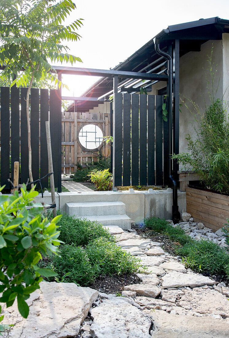 Stone path through the garden to the house