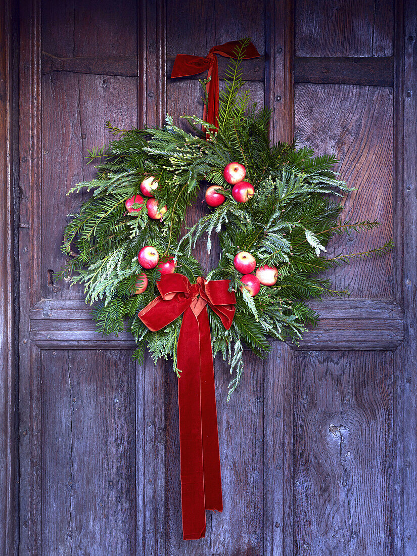 Christmas door wreath on a wooden door