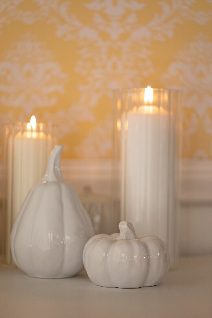 Ceramic pumpkins and candles