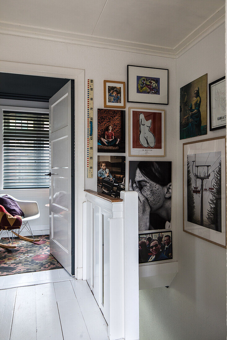 Wall decoration with framed pictures in the hallway