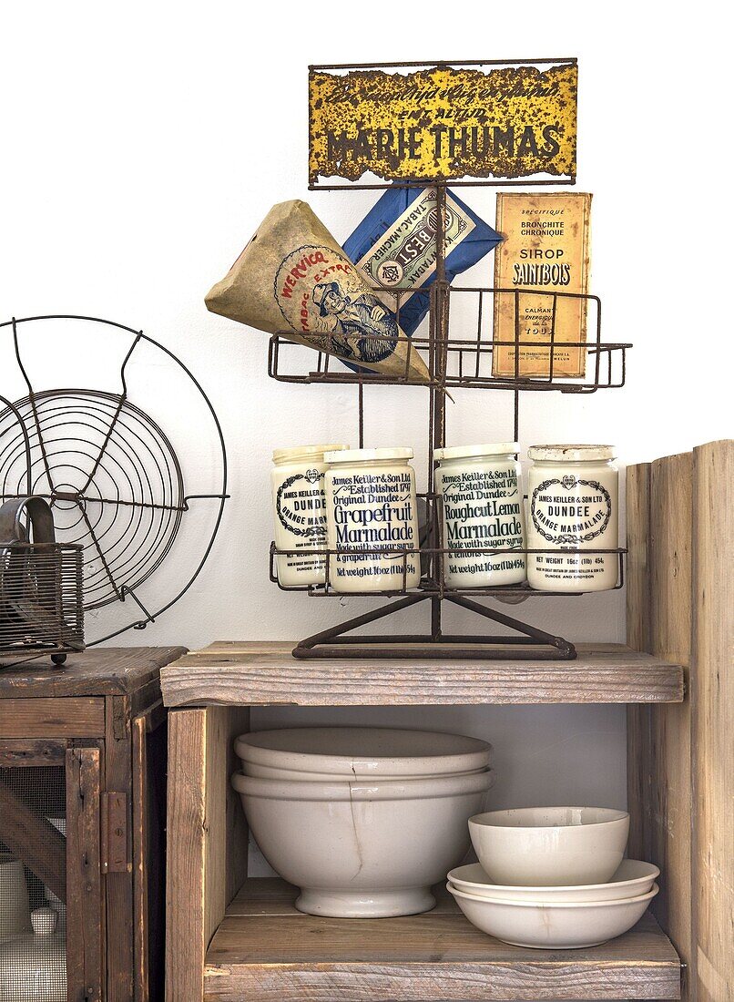 Kitchen shelf with jam jars and antiques